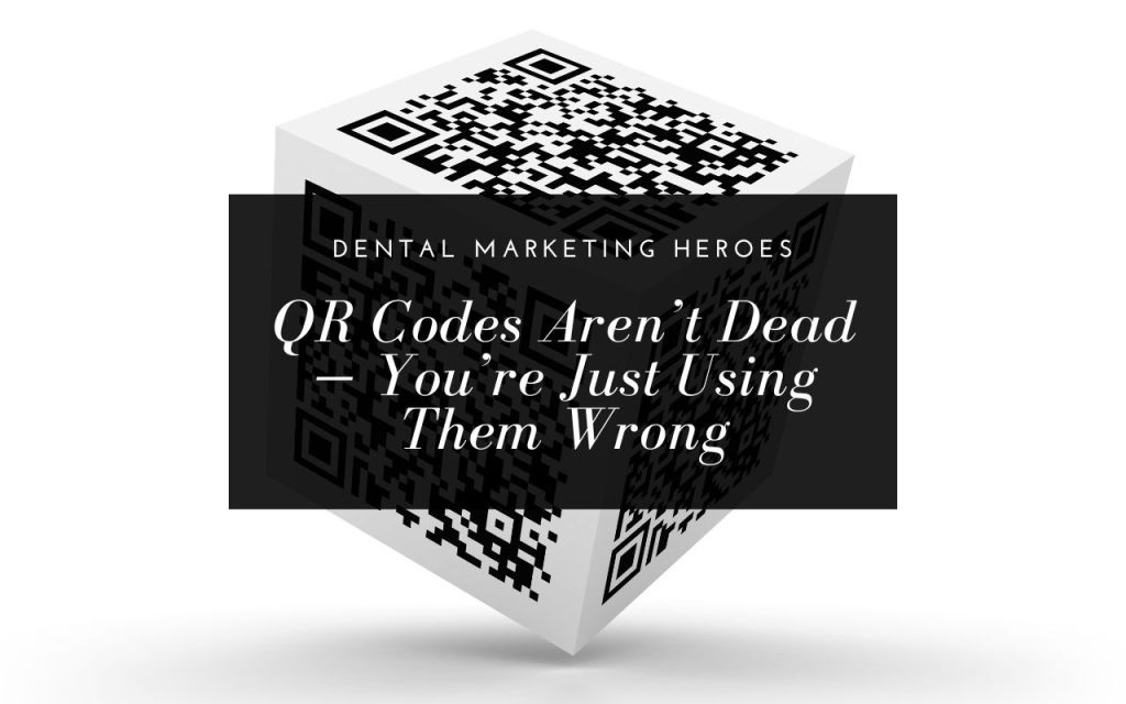 A cube covered in QR codes with a dark overlay text reading, "Dental Marketing Heroes: QR Codes Aren’t Dead – You’re Just Using Them Wrong.